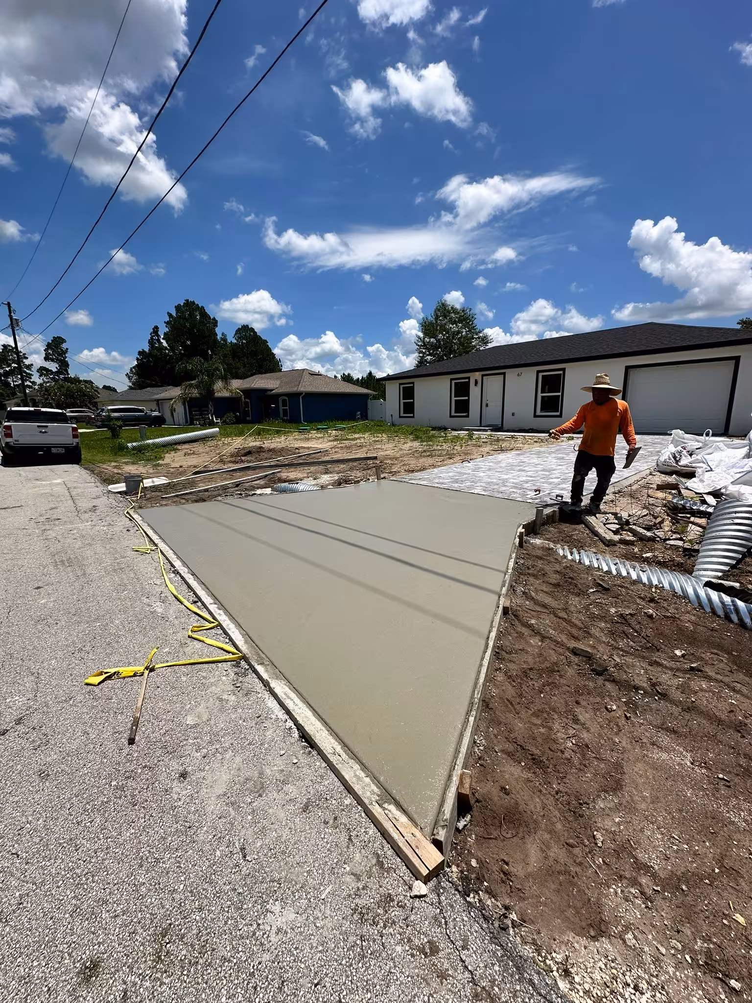 Concrete slabs, driveways and site work